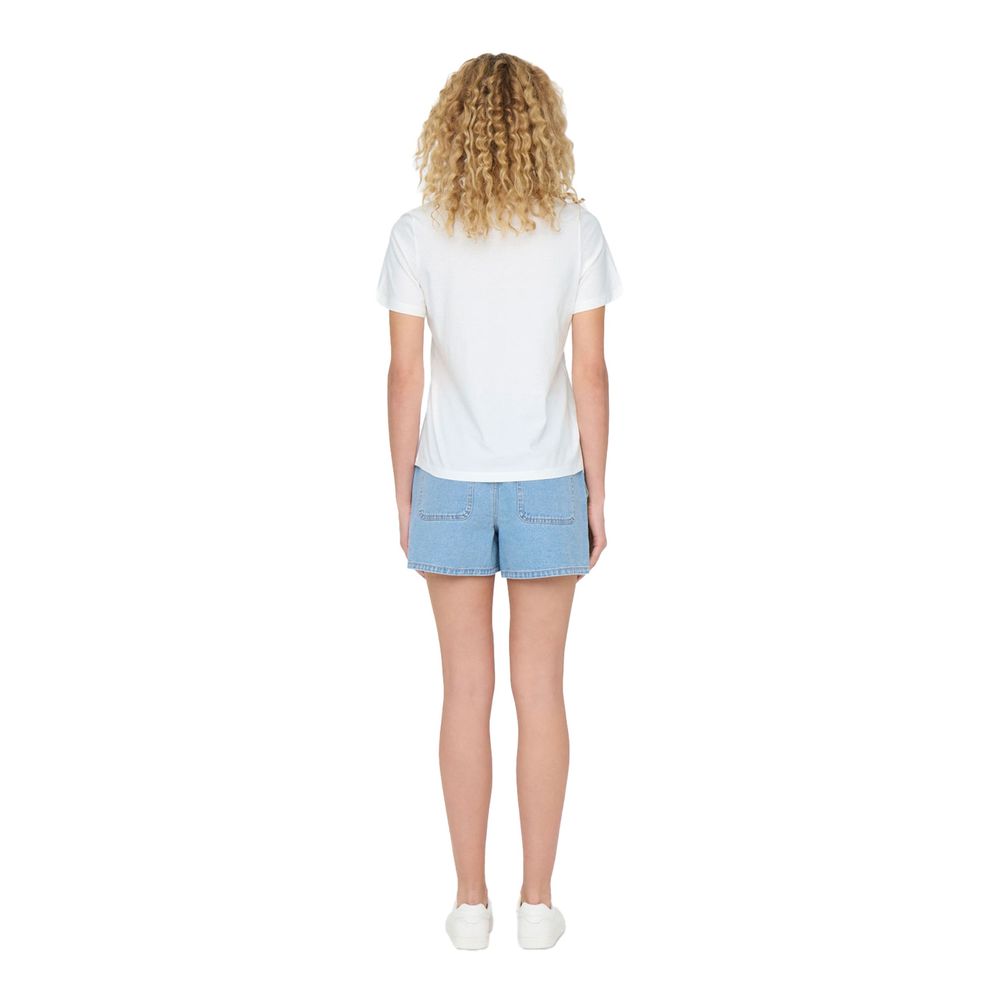 Back view of model wearing Jacqueline De Yong White Cotton T-Shirt with denim shorts, showcasing casual summer fashion.