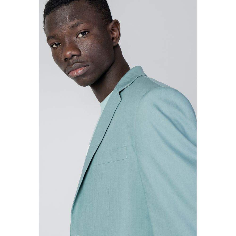 Model wearing Antony Morato Green Tencel Suit Jacket, showcasing elegance and comfort with a modern design.