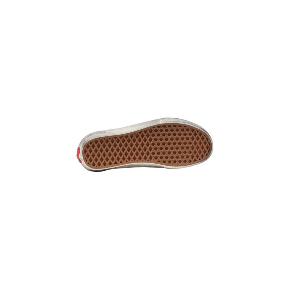 Bottom view of Vans Old Skool sneaker showcasing waffle sole design for traction and durability.