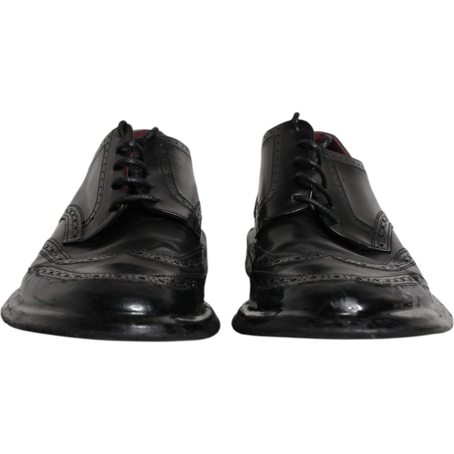 Dolce & Gabbana black leather derby wingtip formal shoes, Italian craftsmanship, 100% calfskin, lace-up with logo details.