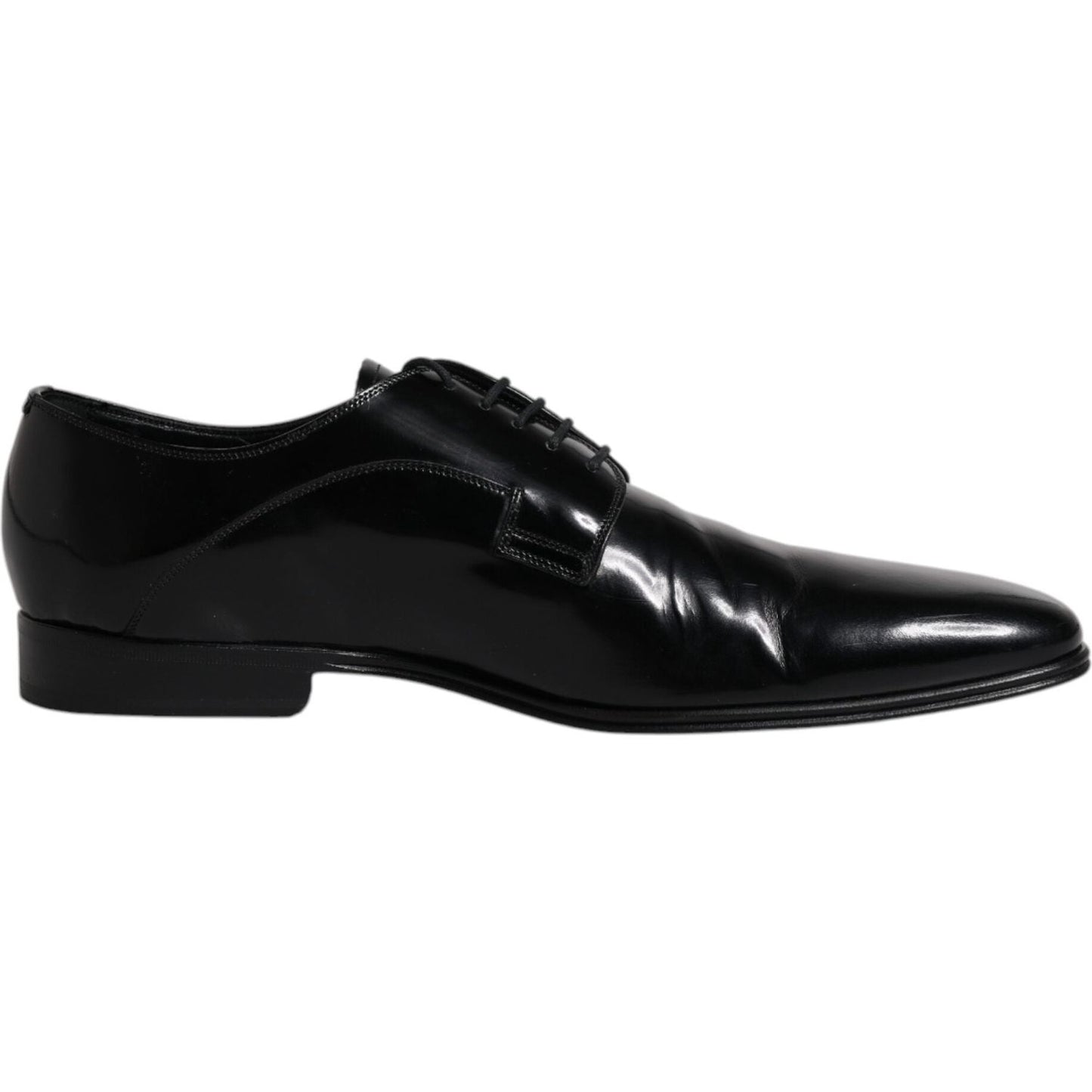 Dolce & Gabbana black leather lace-up Derby formal shoes for men with calf leather, logo details, and high craftsmanship made in Italy.