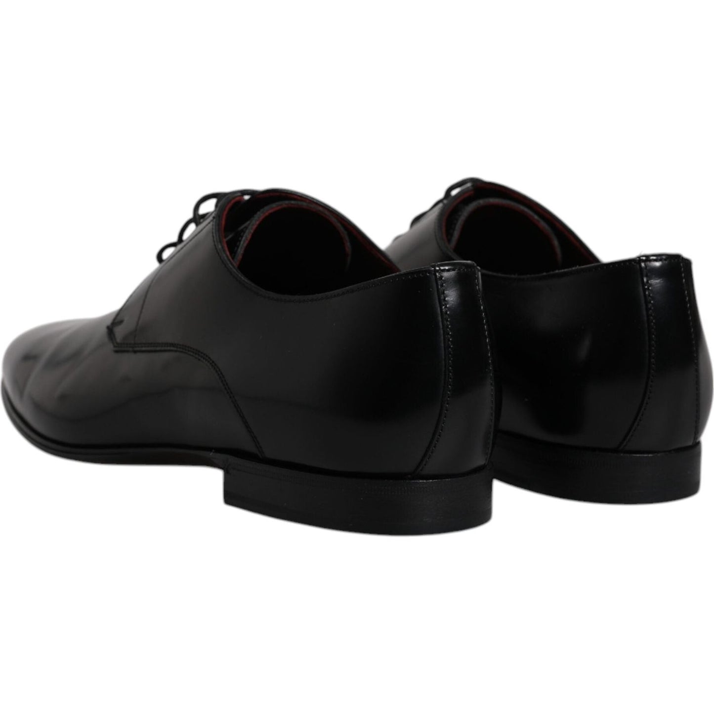 Dolce & Gabbana black leather lace-up derby formal shoes, rear view, showcasing sleek calf leather and high craftsmanship.