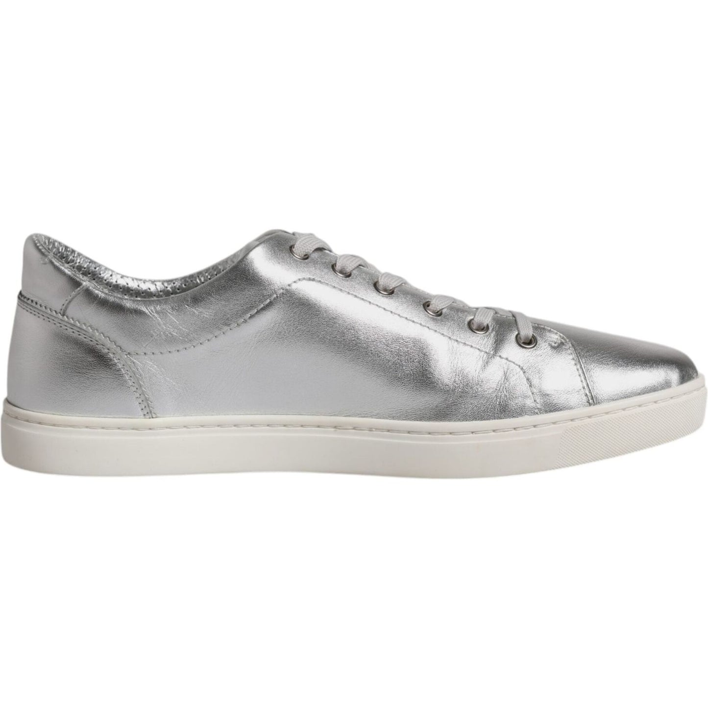 Dolce & Gabbana silver leather low top sneakers with rubber sole and lace-up closure, featuring logo details and crafted in Italy.