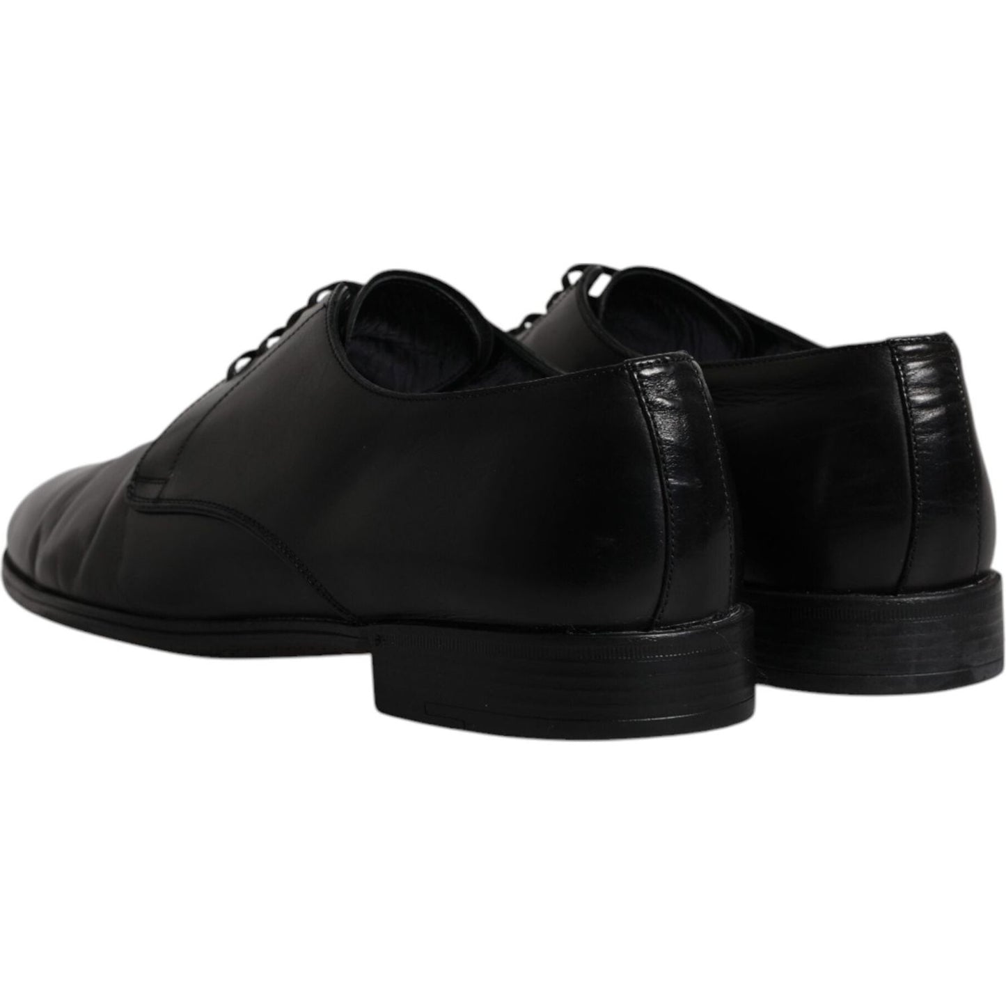 Dolce & Gabbana black leather Derby formal shoes, lace-up design, rear view, high-quality craftsmanship, slightly preowned condition.
