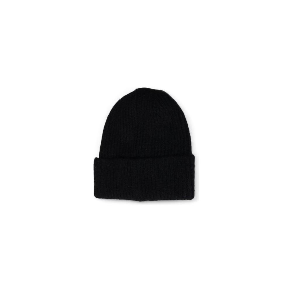 Black ribbed beanie hat on white background, featuring simple design and folded brim.