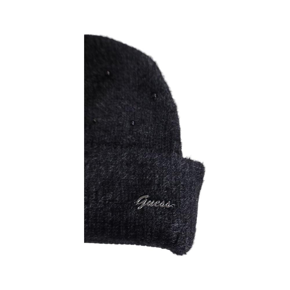 Women's Guess black cotton hat, fall/winter collection, made of 61% cotton and 39% acrylic. Stylish warm accessory for colder months.