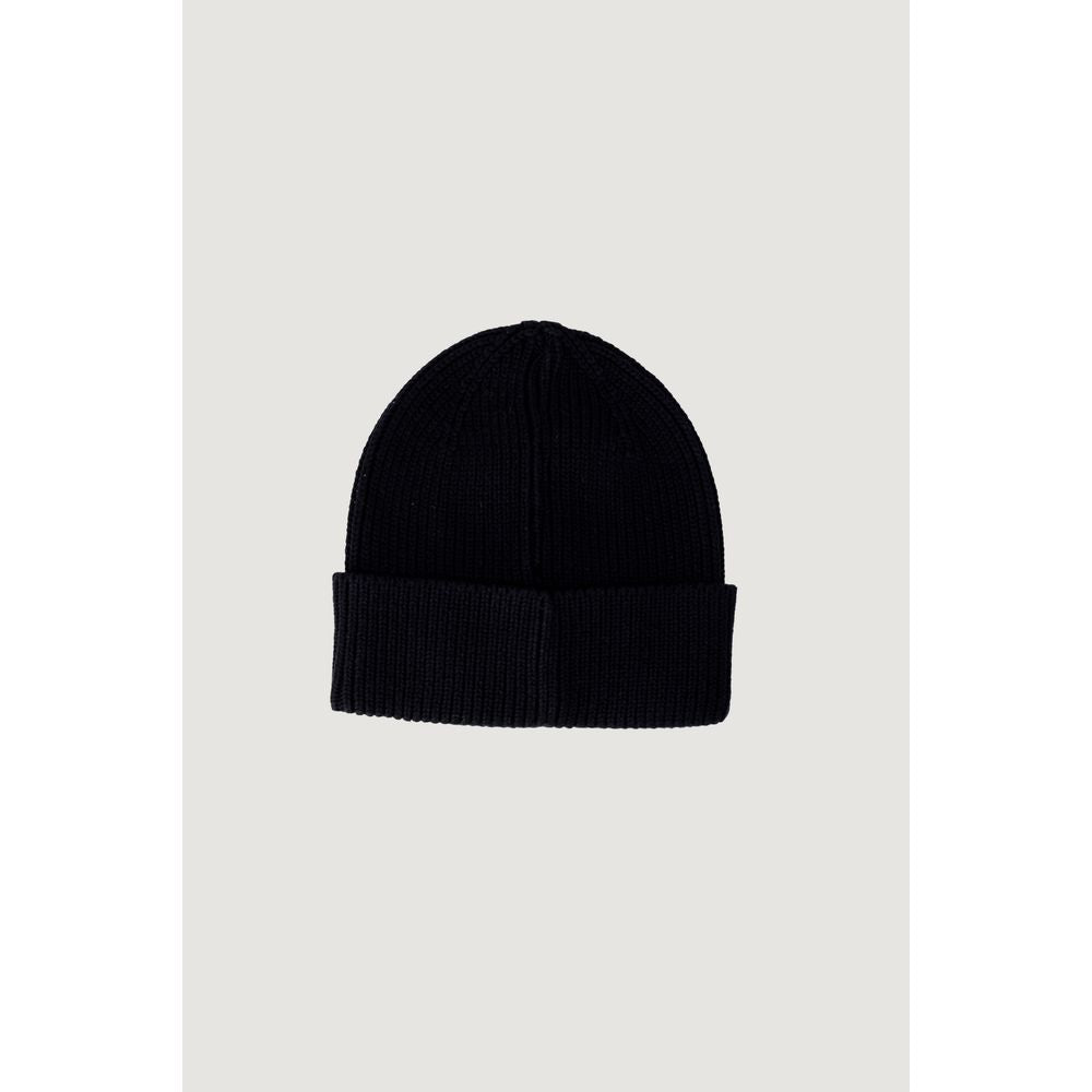 Calvin Klein Jeans black cotton beanie with ribbed design and embroidered logo for women, elegant and versatile winter accessory.