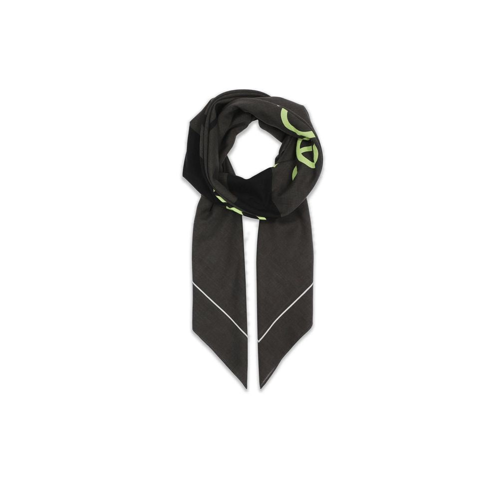 Calvin Klein black organic cotton scarf with cut-out logo design, folded in a stylish manner.