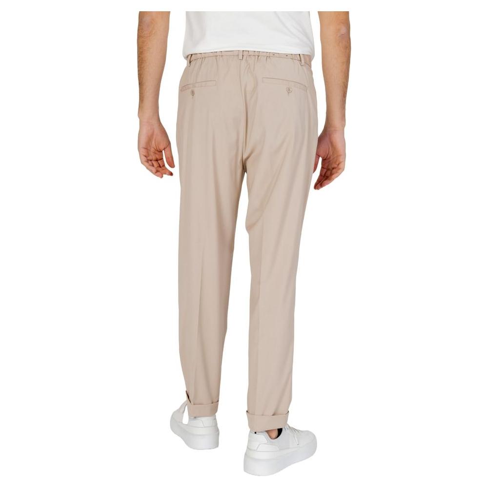 Back view of Antony Morato beige pants, spring/summer collection, made of polyester, viscose, and elastane blend.