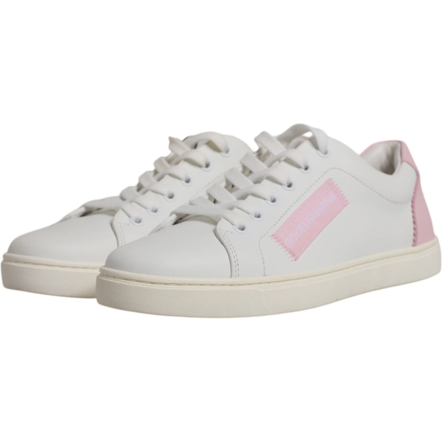 Dolce & Gabbana white calf leather sneakers with pink accents, rubber sole, lace-up closure, logo details, made in Italy, high quality.