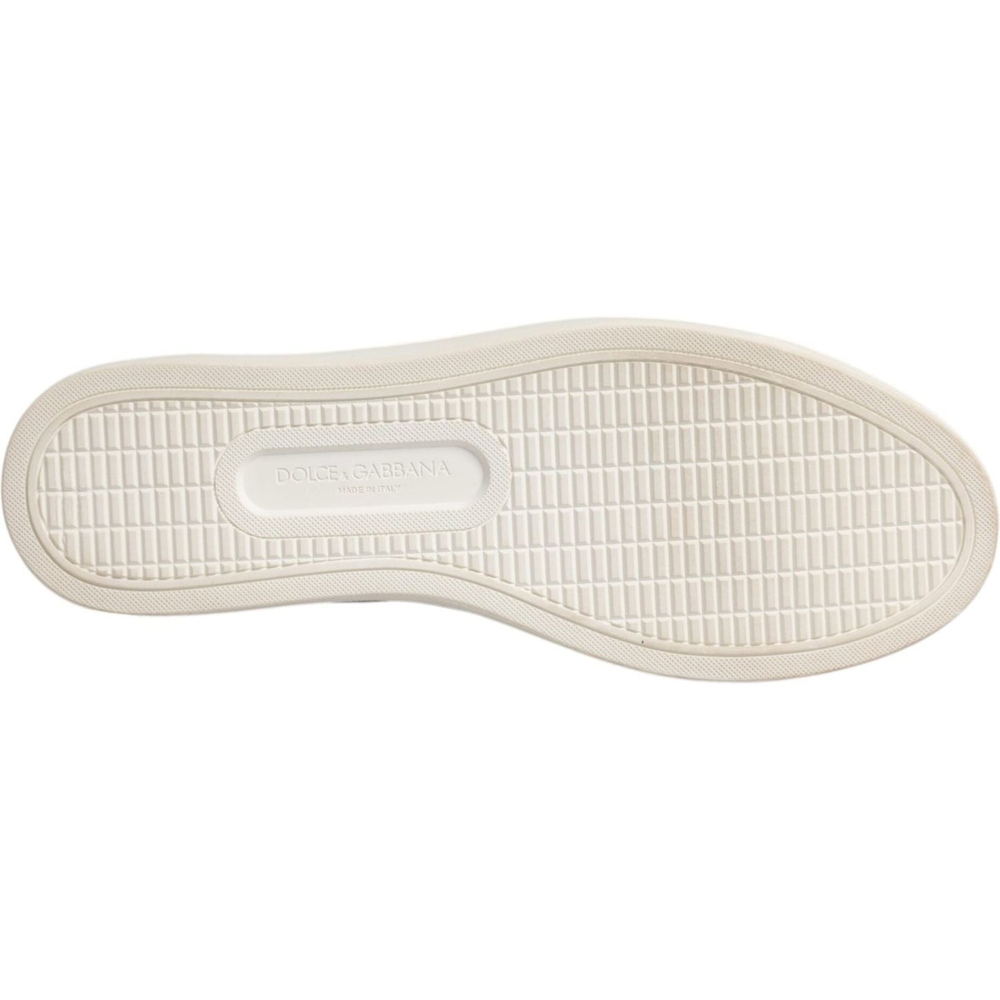 Sole of Dolce & Gabbana white calf leather sneakers showing rubber texture and logo detail.