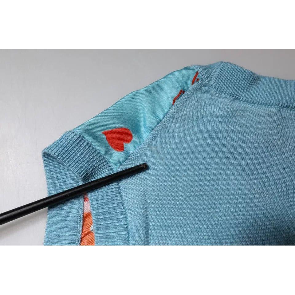 Dolce & Gabbana blue cashmere sleeveless tank top with heart print detail, showing a close-up of minor make-up stain on fabric.