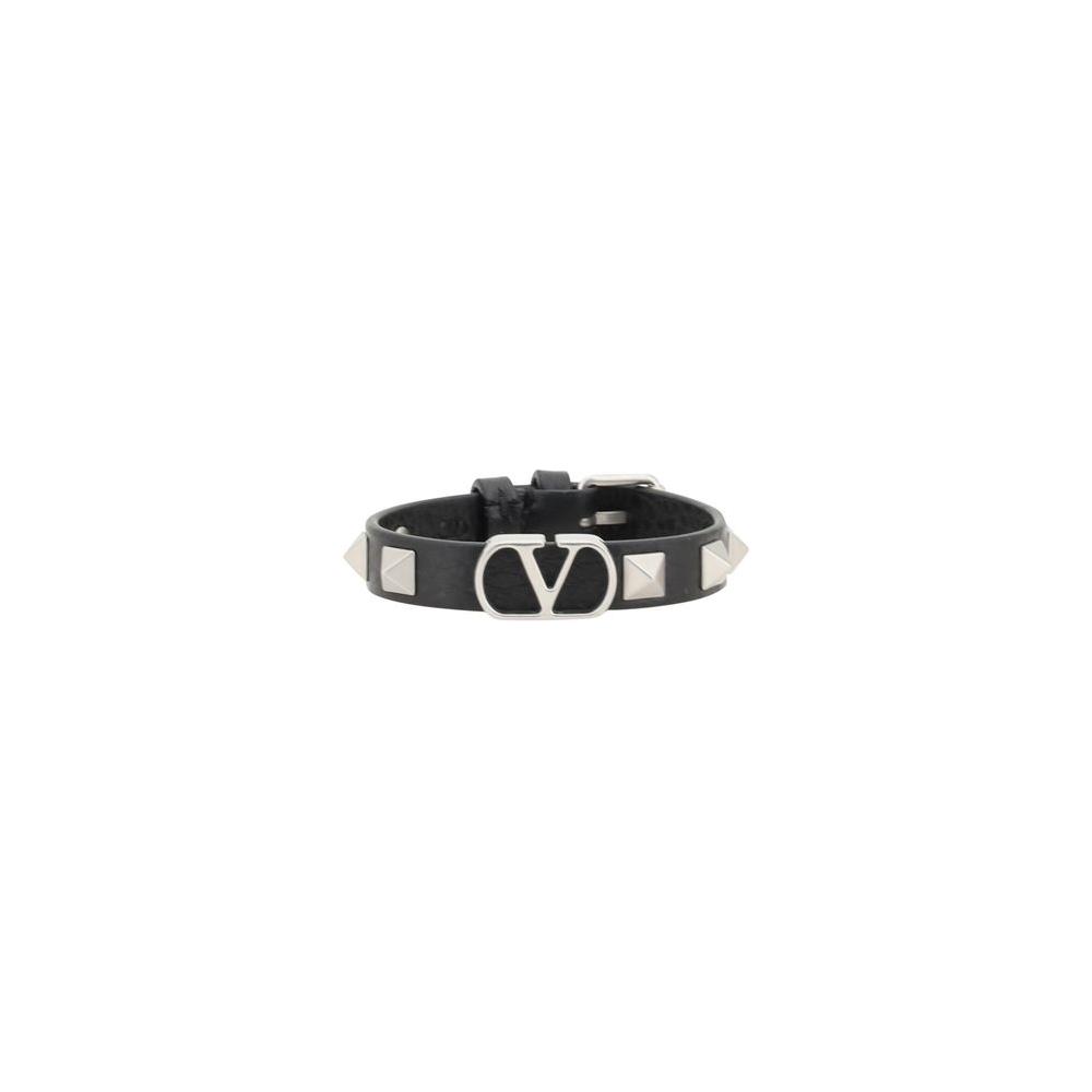 Valentino Garavani Vlogo Bracelet in black leather with Rockstud accents, featuring iconic logo and adjustable buckle.