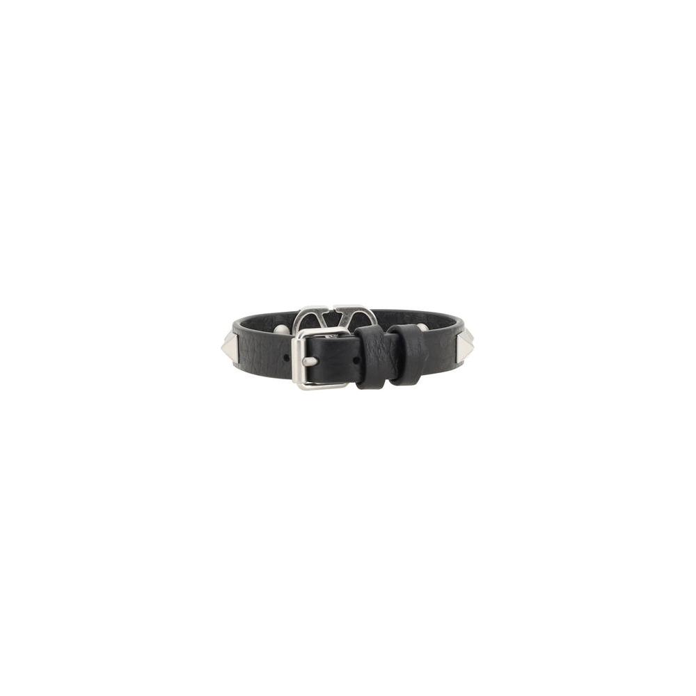 Valentino Garavani Vlogo Bracelet with smooth leather, adjustable buckle, and signature Rockstud studs design.