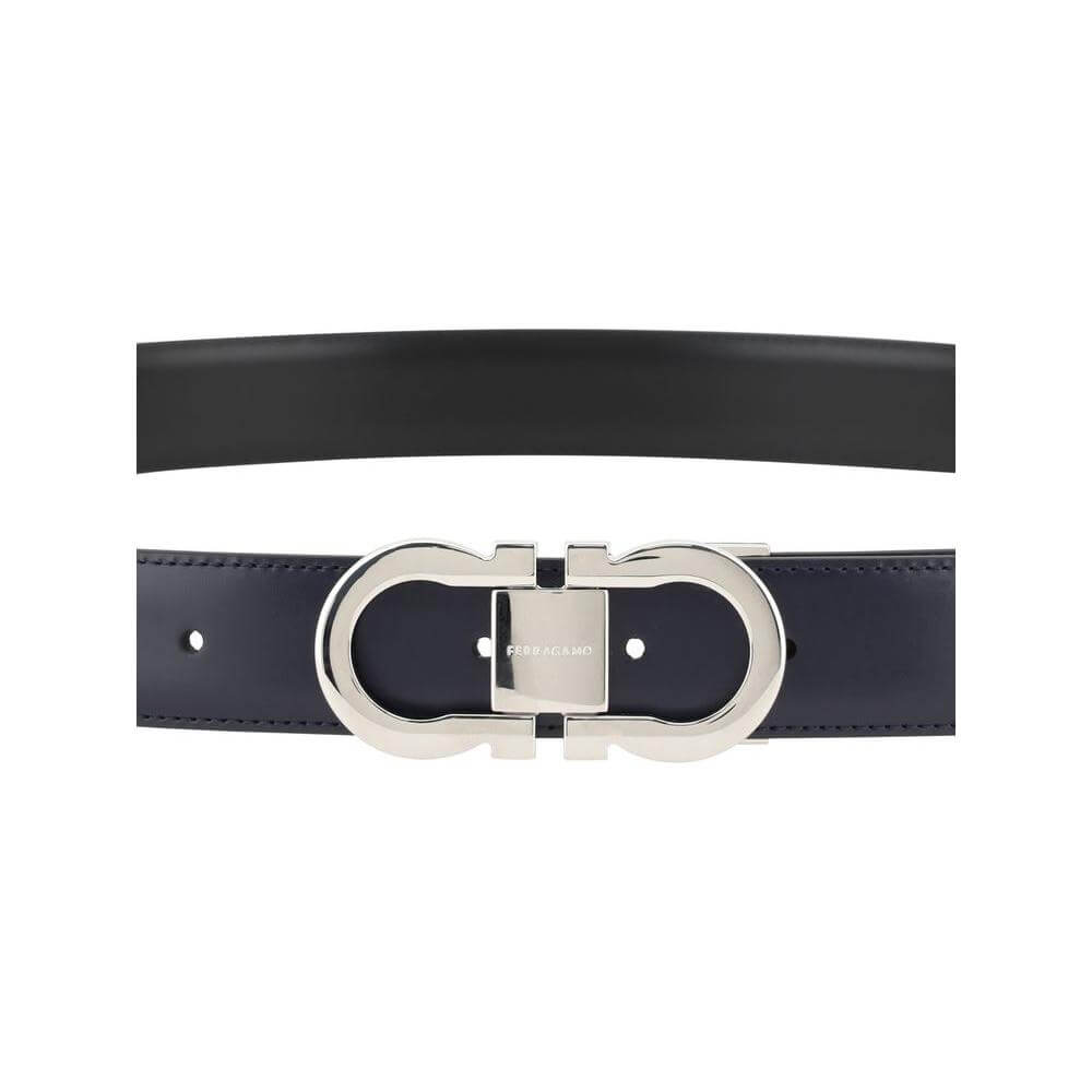 Ferragamo reversible leather belt with double-face design and metal buckle featuring the iconic Gancini logo.