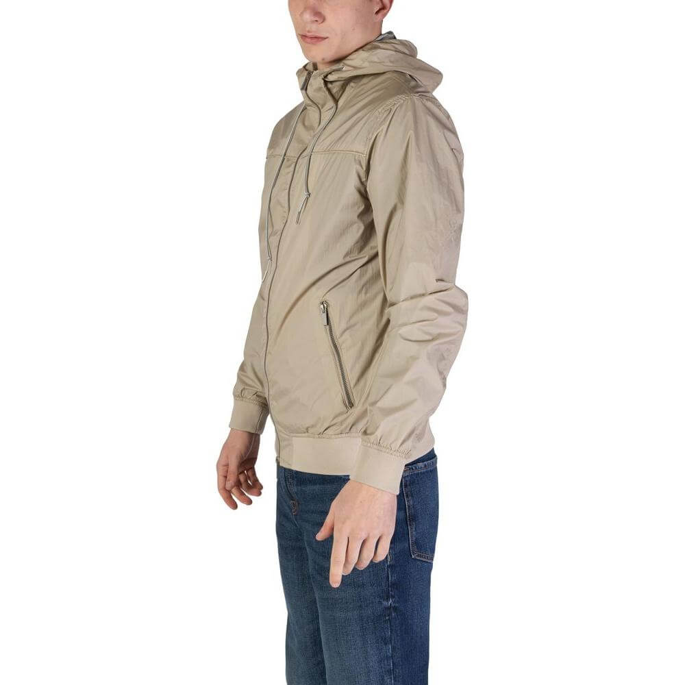 Alt Tag: Hamaki-Ho men's beige nylon jacket for fall/winter, side view on model, 100% nylon composition