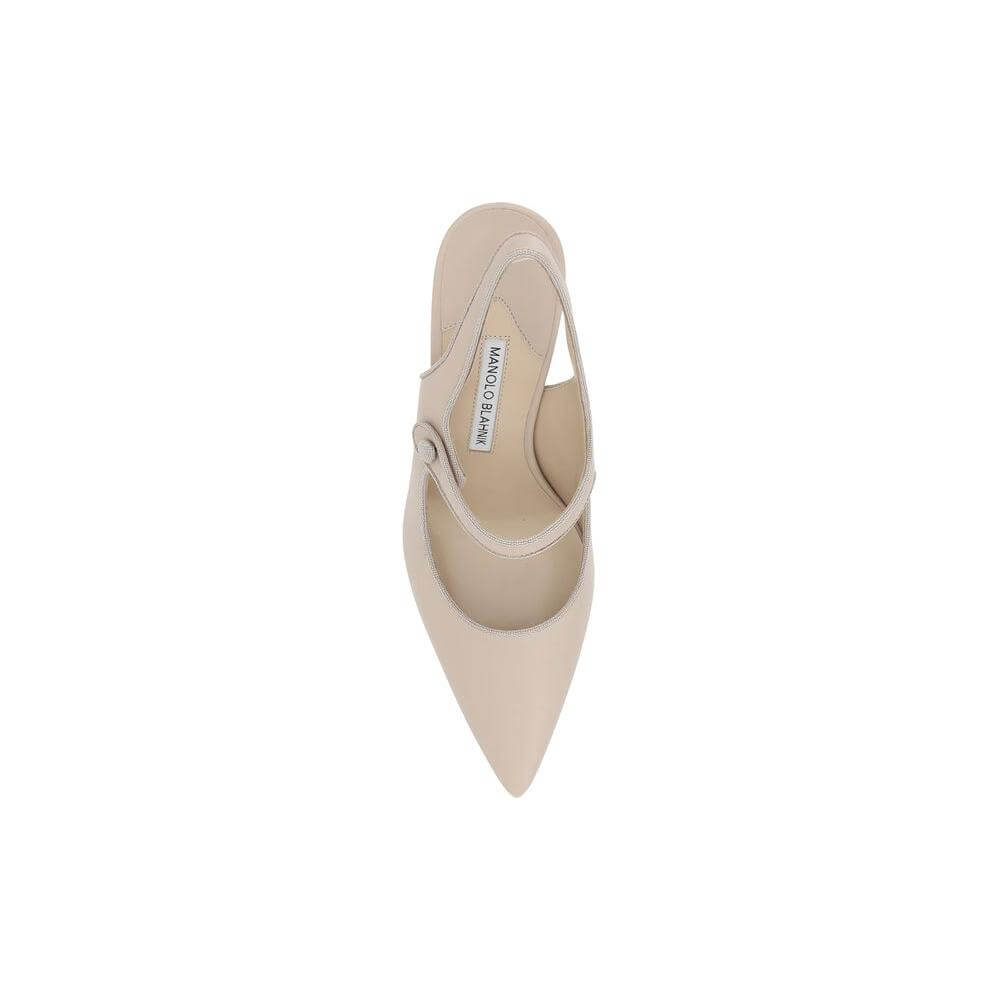 Top view of Manolo Blahnik Camparisli Pump with elongated toe, button closure, and branded insole in beige leather.