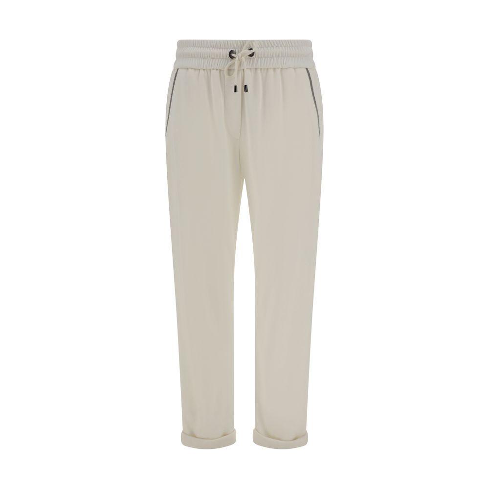 Brunello Cucinelli cotton pants with embellishments, featuring elastic waistband, drawstring, jewel pockets, and cuffed hem for stylish comfort.