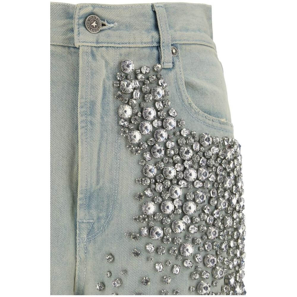Close-up of Golden Goose Golden Jeans with rhinestone embellishment on the front, showcasing urban style and glam details.