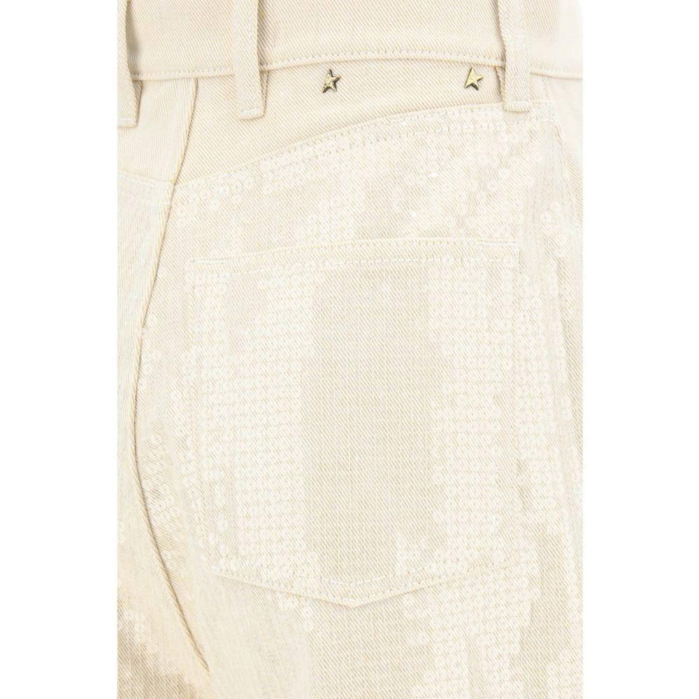 Golden Goose denim pants with bright sequin appliqué, featuring five-pocket style and small star details on waistband.