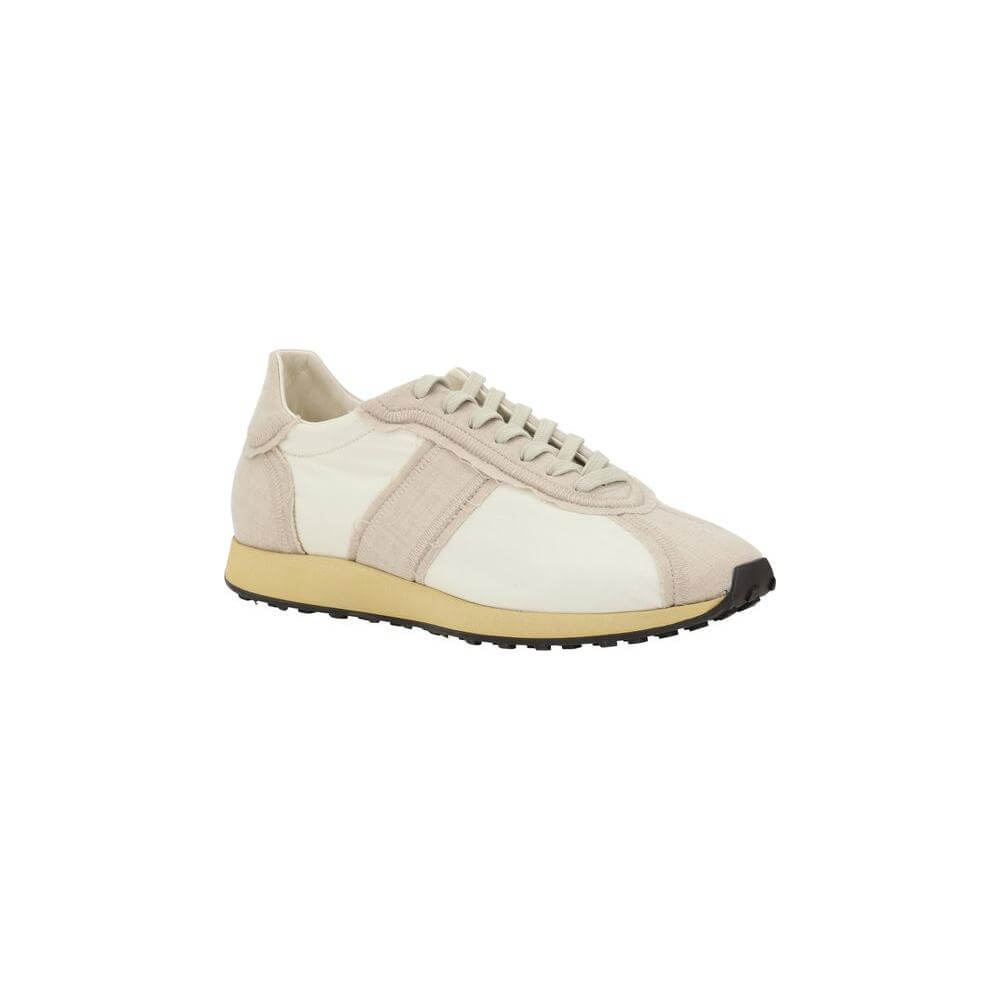 The Row Moveo Sneakers with lace-up closure, paneled design, flat sole, and reinforced toe offering comfort and modern style.