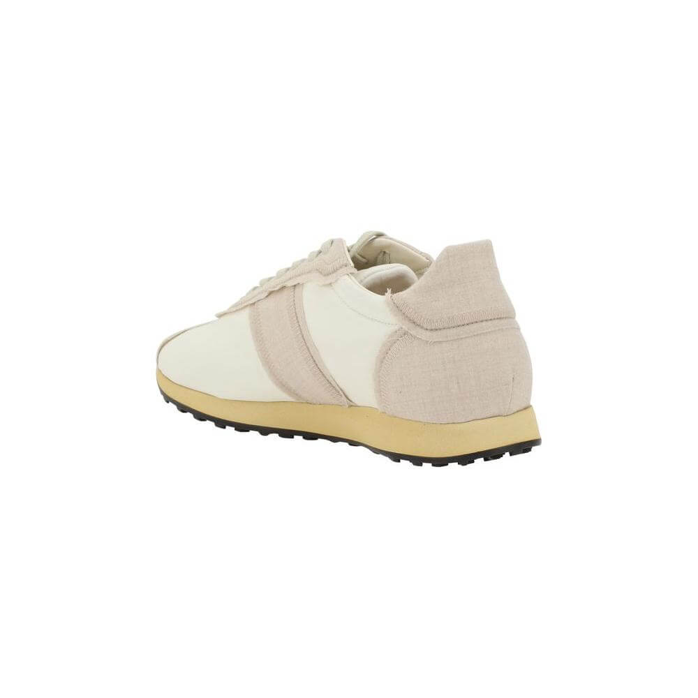Back view of The Row Moveo Sneakers highlighting the sleek design, paneled texture, and flat sole for comfort and durability.