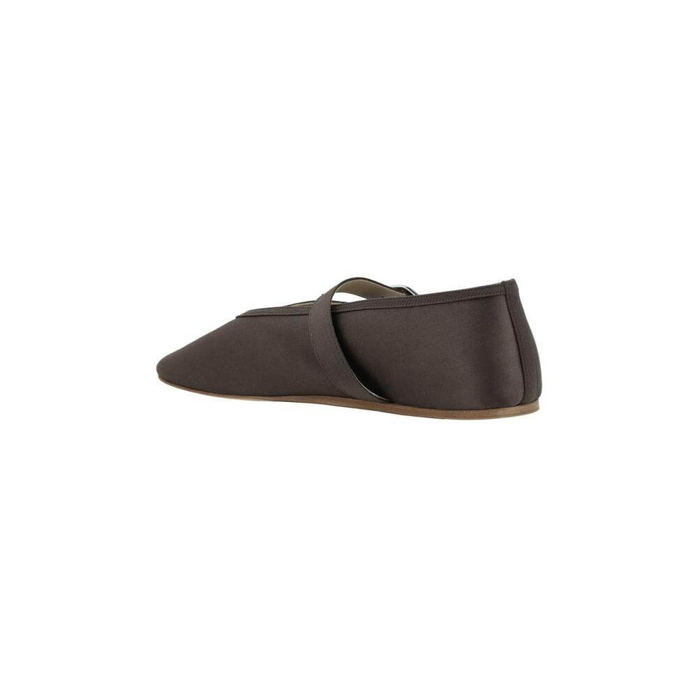 Side view of Le Monde Beryl Stella Ballerinas in leather, showcasing flat sole and adjustable strap for comfort and elegance.