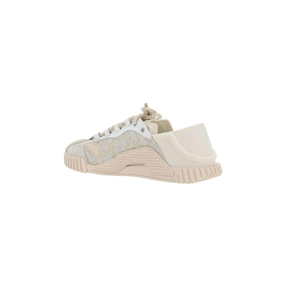 Dolce & Gabbana sneaker with textured rubber sole, lace and fabric upper, and monogram logo on side view.
