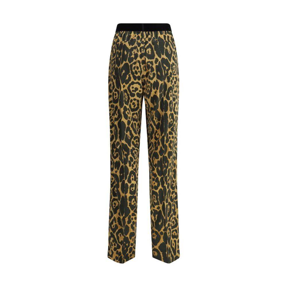 Tom Ford silk pants with animal pattern and contrasting waistband, featuring two side welt pockets and two back patch slit pockets.