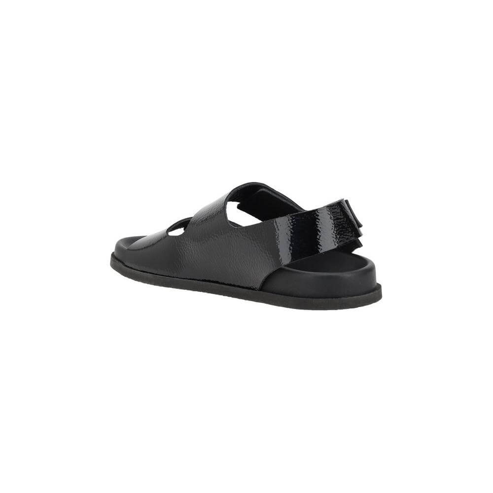 Pedro García Dinka Sandals back view with Velcro ankle strap and flat sole in black leather.