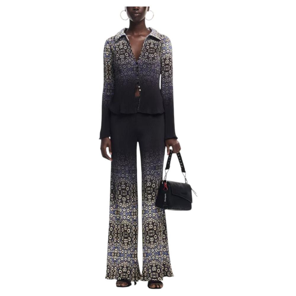 Model holding Desigual black polyethylene handbag with floral outfit from Spring/Summer collection