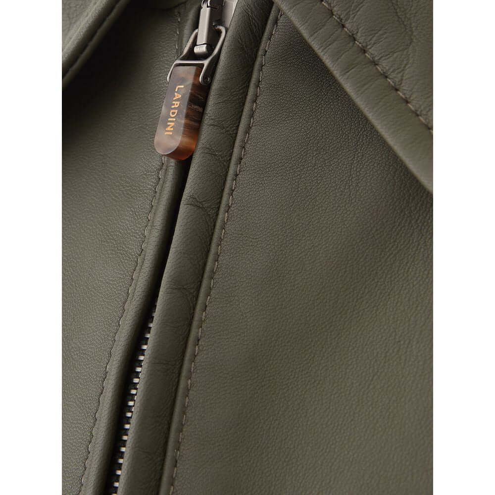 Close-up of Lardini green leather jacket with zip closure and detailed stitching, showcasing premium craftsmanship.