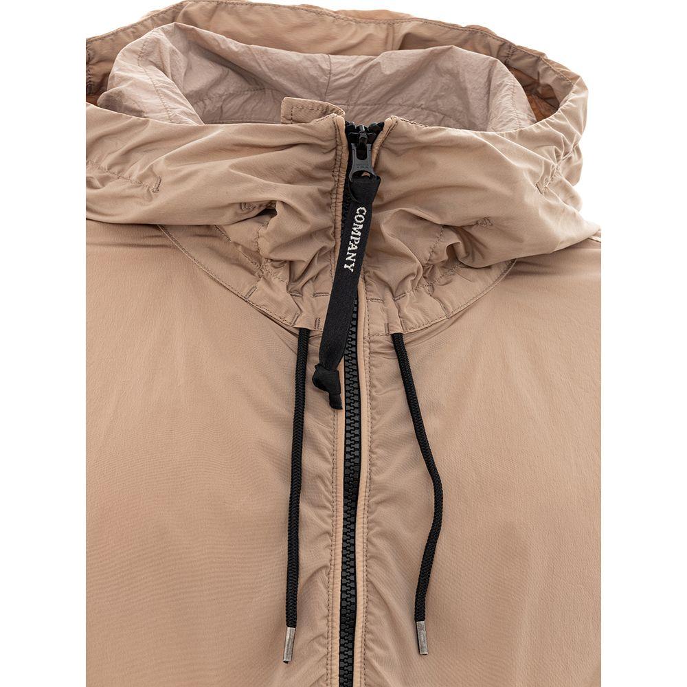 C.P. Company Beige Polyamide Jacket showcasing hood and front zipper for contemporary urban style.