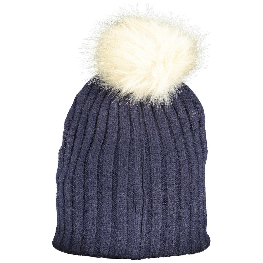 Norway 1963 blue polyester hat with fur pompom, appliqué, and logo. Cozy winter accessory.