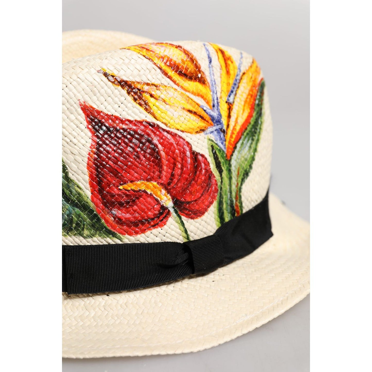 Dolce & Gabbana beige straw fedora hat with vibrant floral print, featuring a black band, made in Italy, 100% straw.