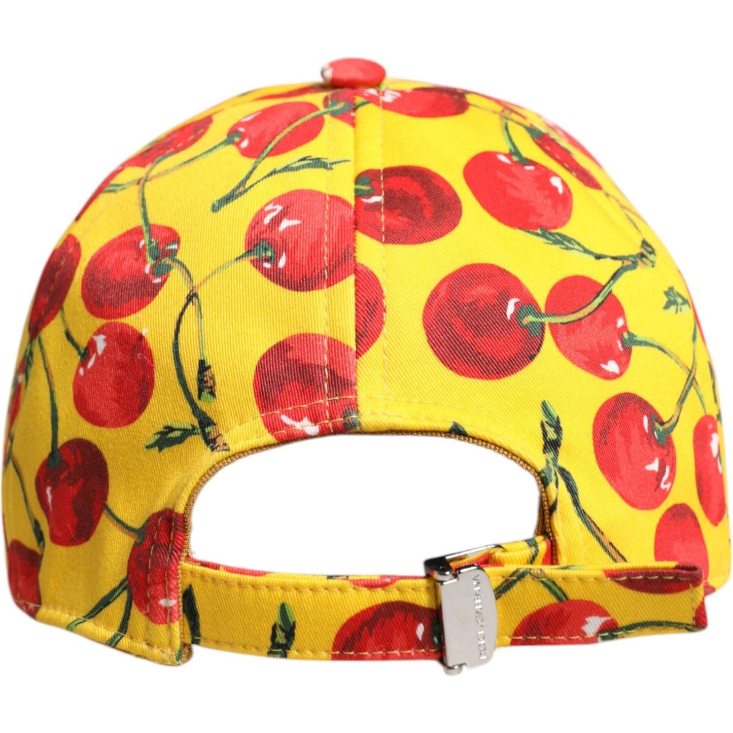 Dolce & Gabbana yellow baseball cap with red cherry print, adjustable strap, and logo detail, 100% cotton, made in Italy.