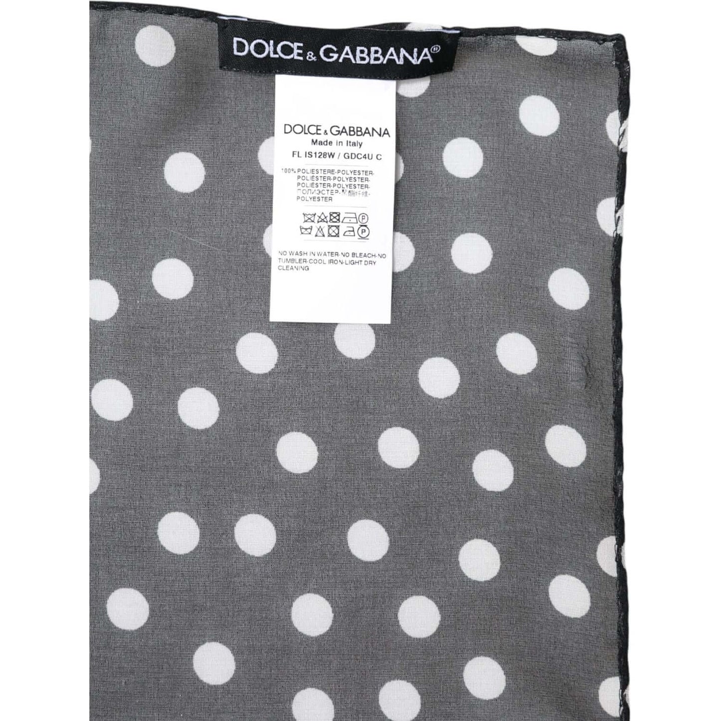 Dolce & Gabbana black polka dot polyester wrap shawl scarf with white dots, logo tag visible, made in Italy.