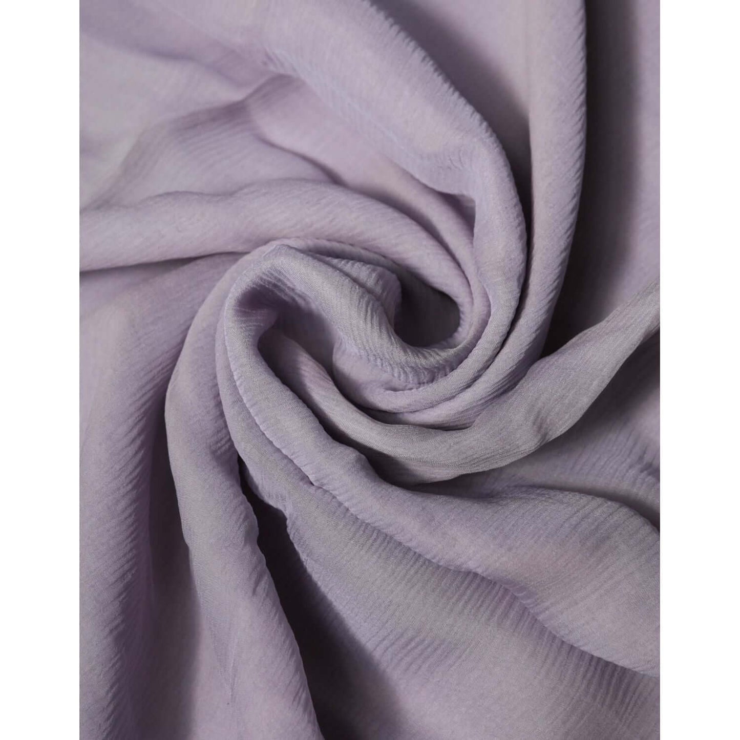 Close-up of a Dolce & Gabbana purple silk rectangle wrap shawl scarf, showcasing luxurious texture and fabric detail.