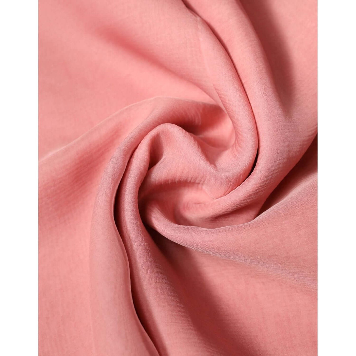 Close-up of Dolce & Gabbana pink silk wrap shawl scarf showing luxurious texture and soft fabric folds.