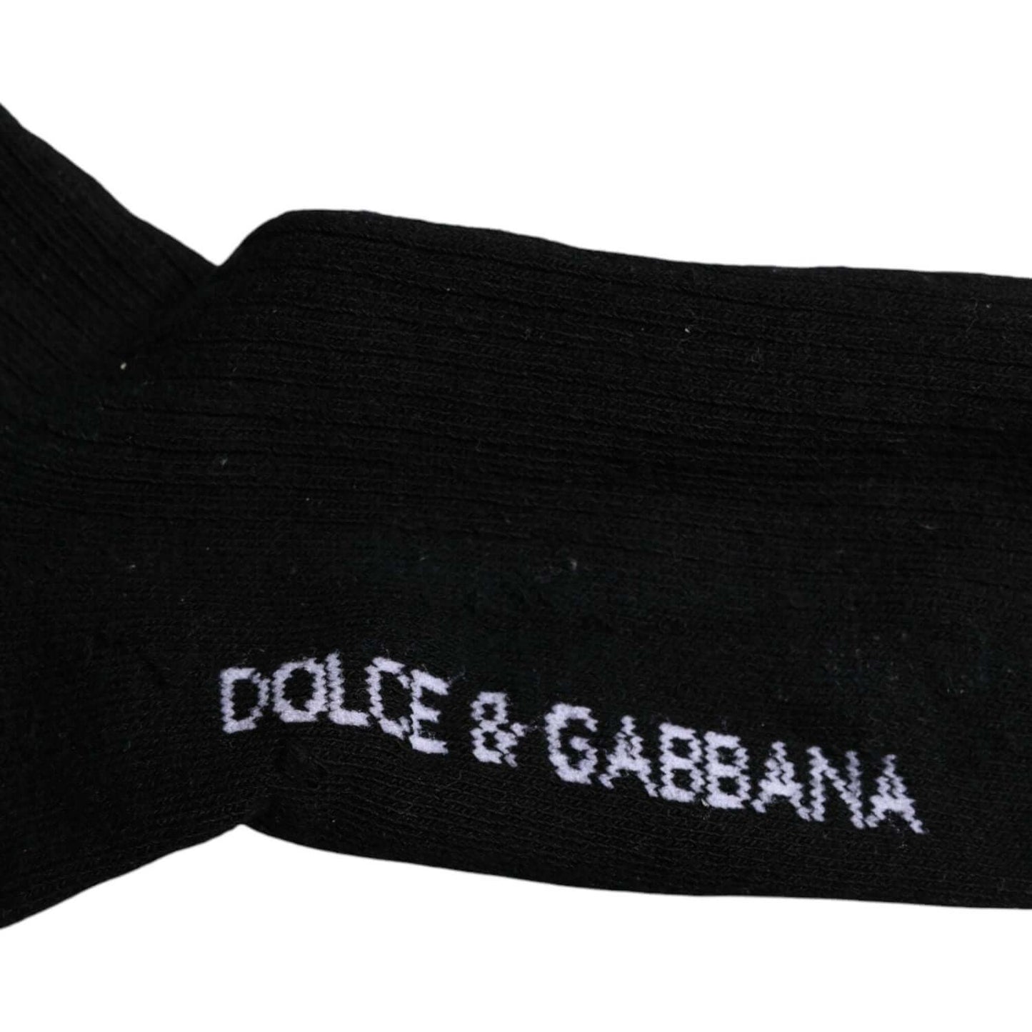 Dolce & Gabbana black mid calf socks with white logo print, cotton stretch material, unisex, made in Italy, slight store sample marks.
