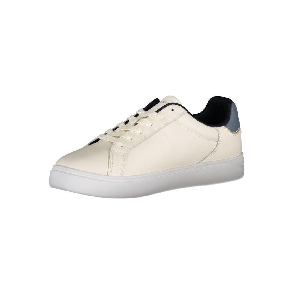 Tommy Hilfiger beige leather women's sneaker with blue accents and iconic logo, showcasing chic and comfortable street style fashion.