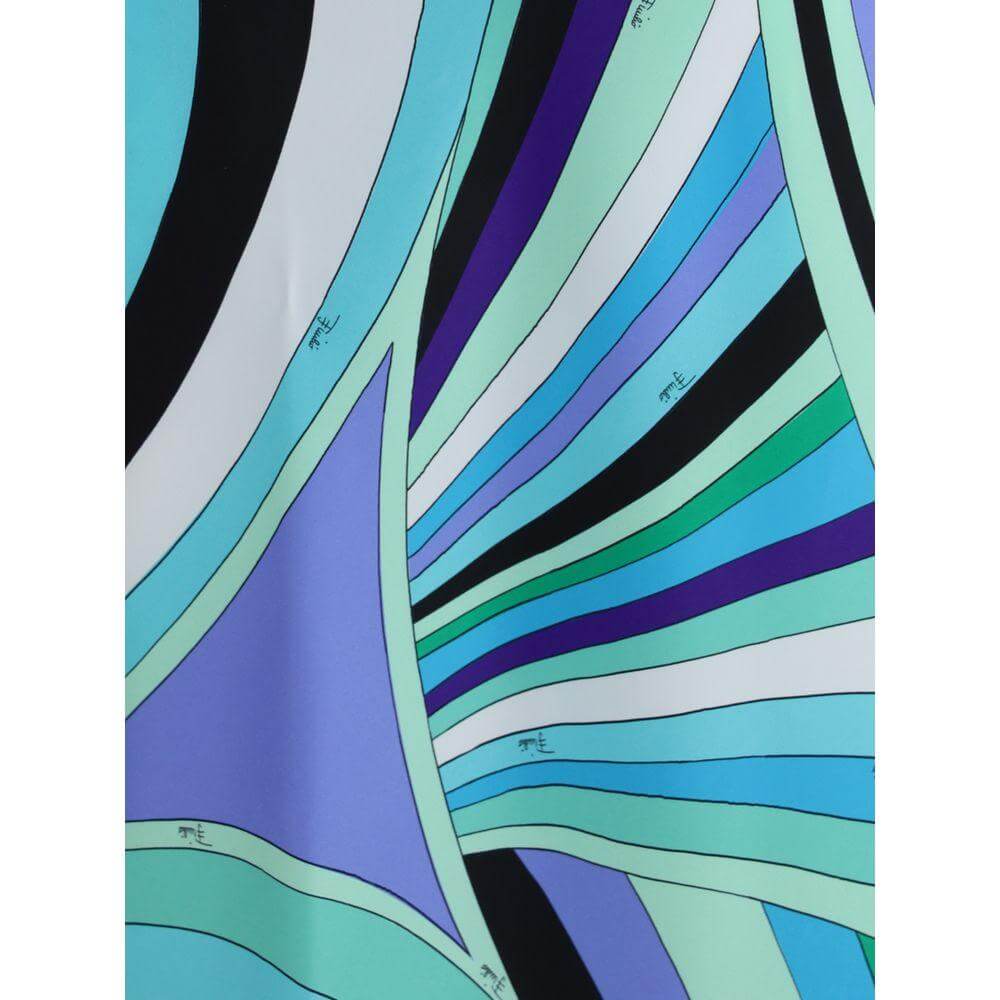 Emilio Pucci Iride print showcasing vibrant, swirling colors in a dynamic pattern, perfect for a sophisticated and stylish look.