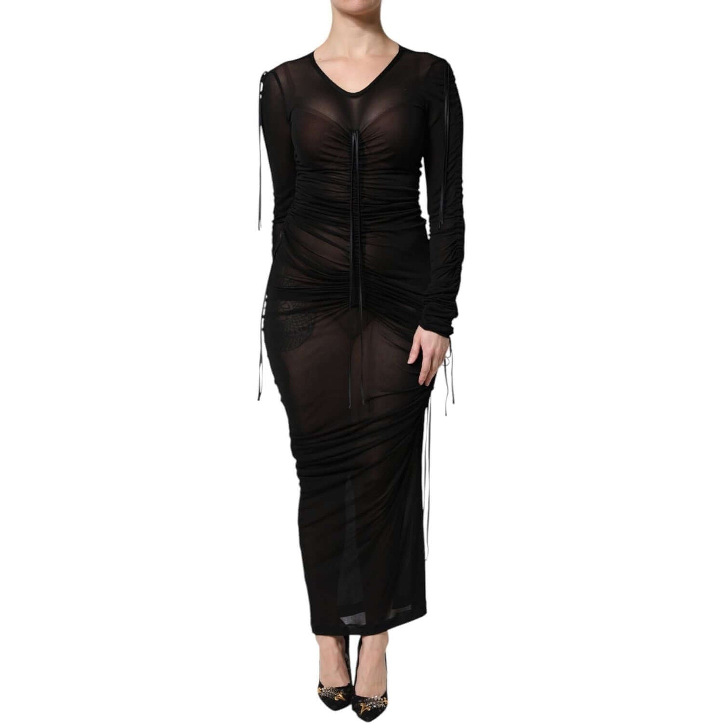 Dolce & Gabbana black mesh trim bodycon dress with long sleeves, tulle design, zipper closure, modeled showing front view.