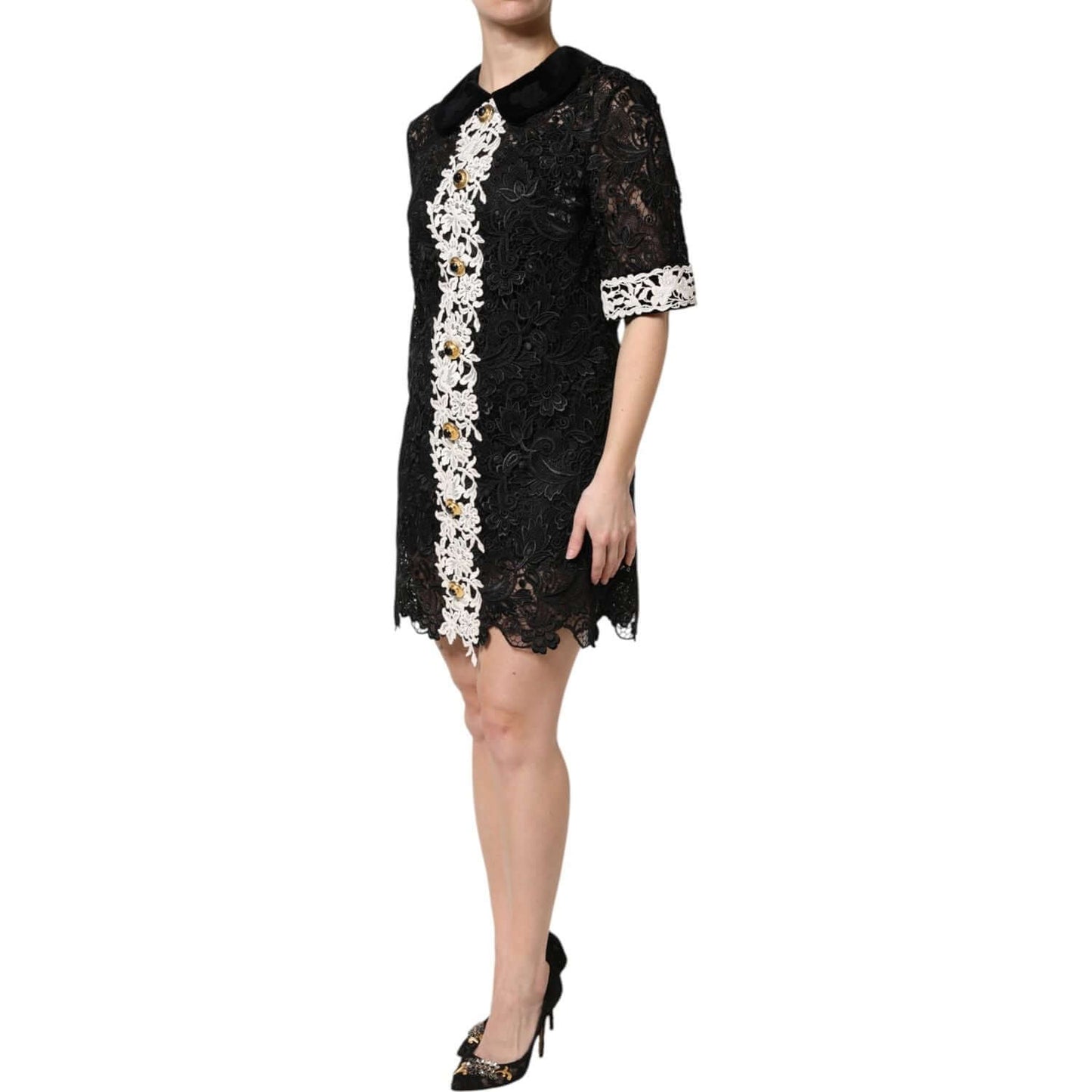 Dolce & Gabbana black floral lace embellished mini dress, sheath style, featuring intricate design, made in Italy, side view.