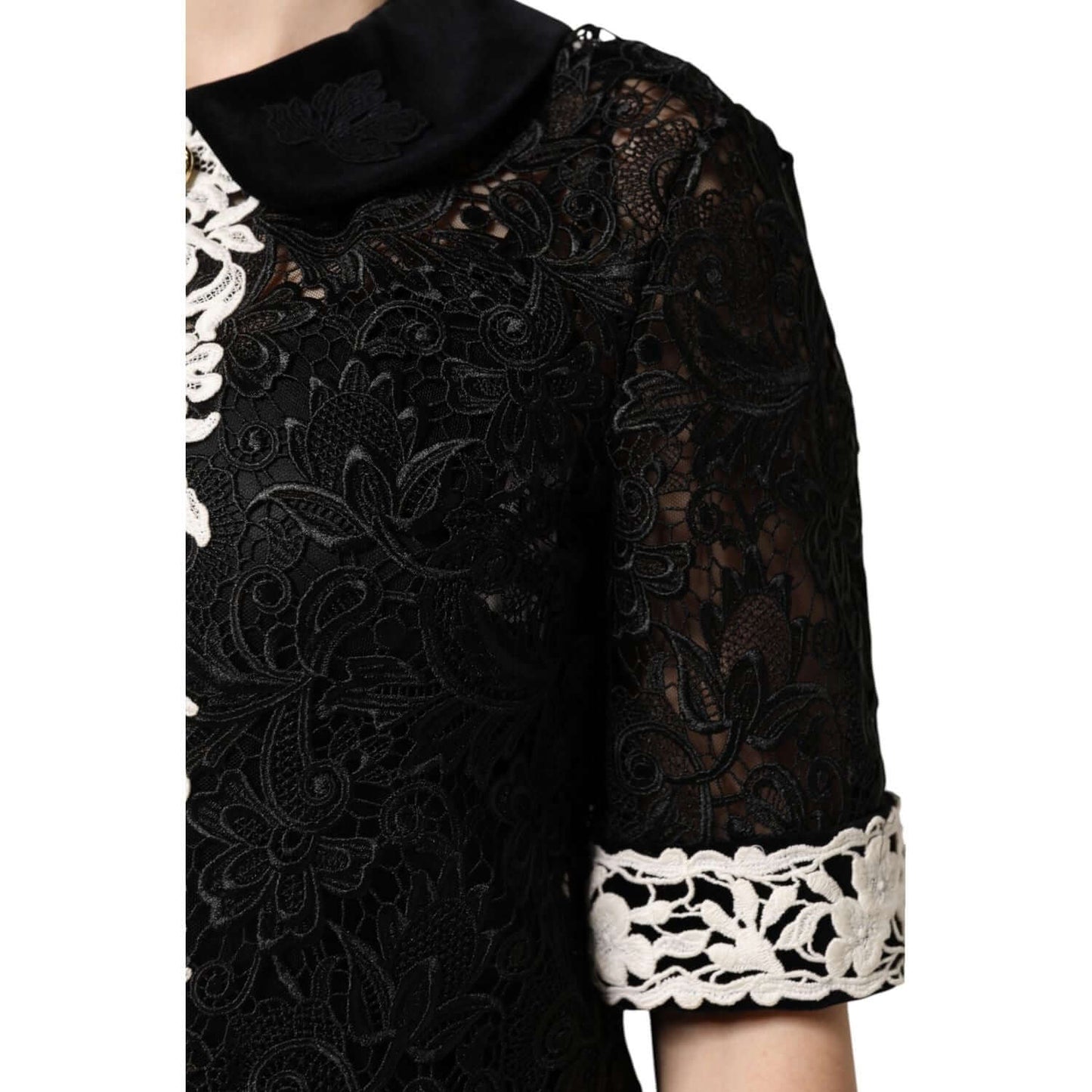 Dolce & Gabbana black floral lace embellished mini dress showcasing intricate lace details and craftsmanship, made in Italy.