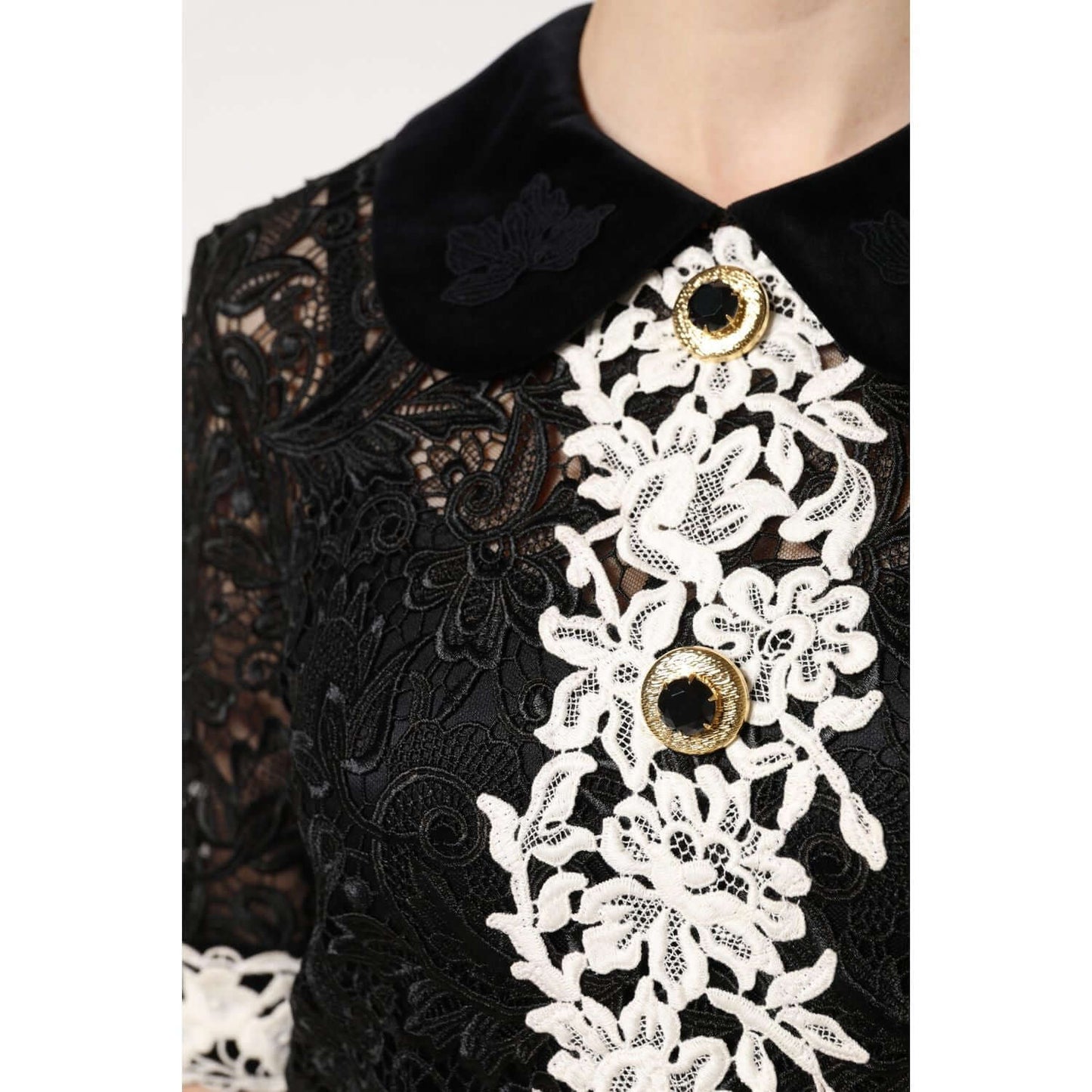 Dolce & Gabbana black floral lace mini dress with white embellishments and button details.