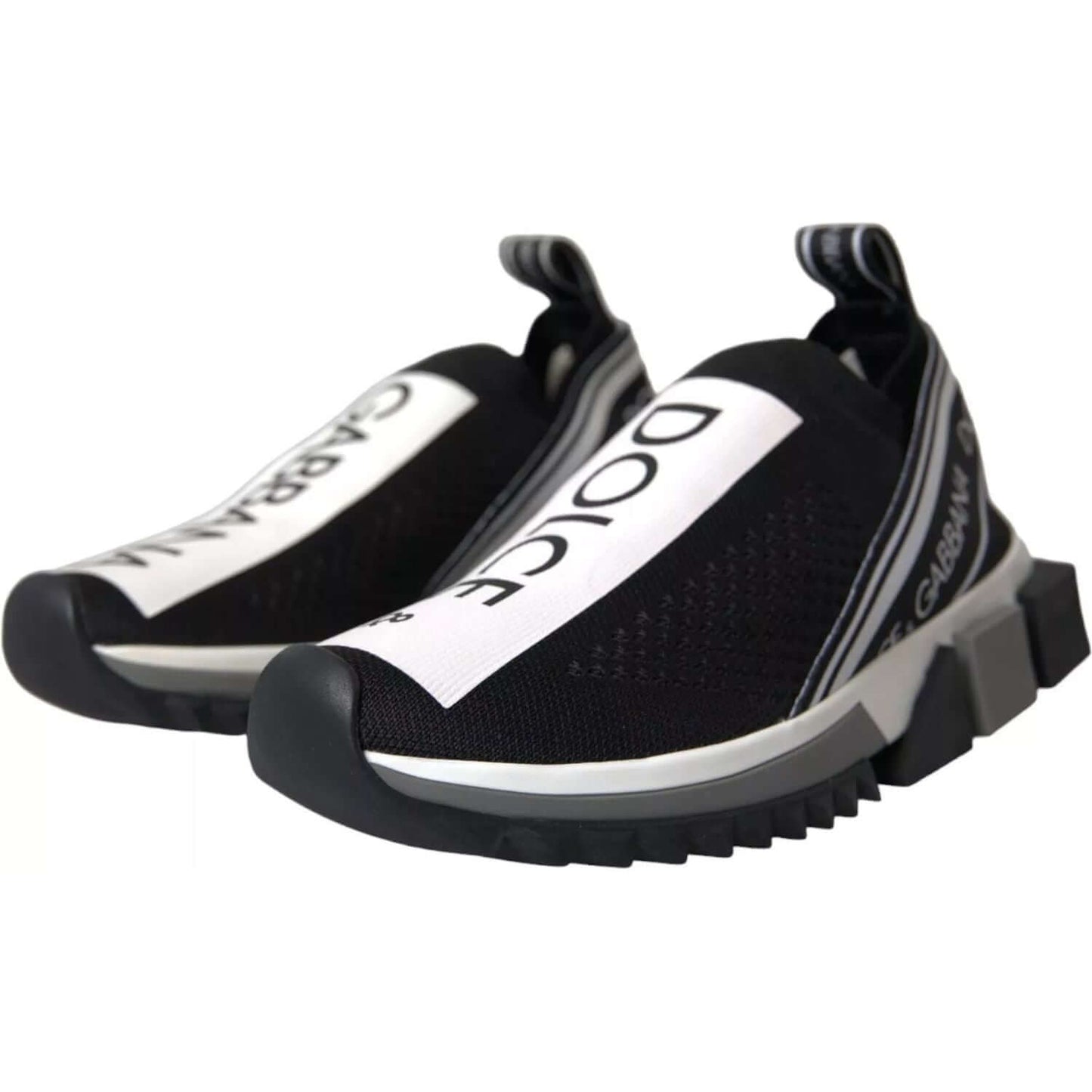 Dolce & Gabbana Sorrento black and white slip-on sneakers with logo print and rubber sole.