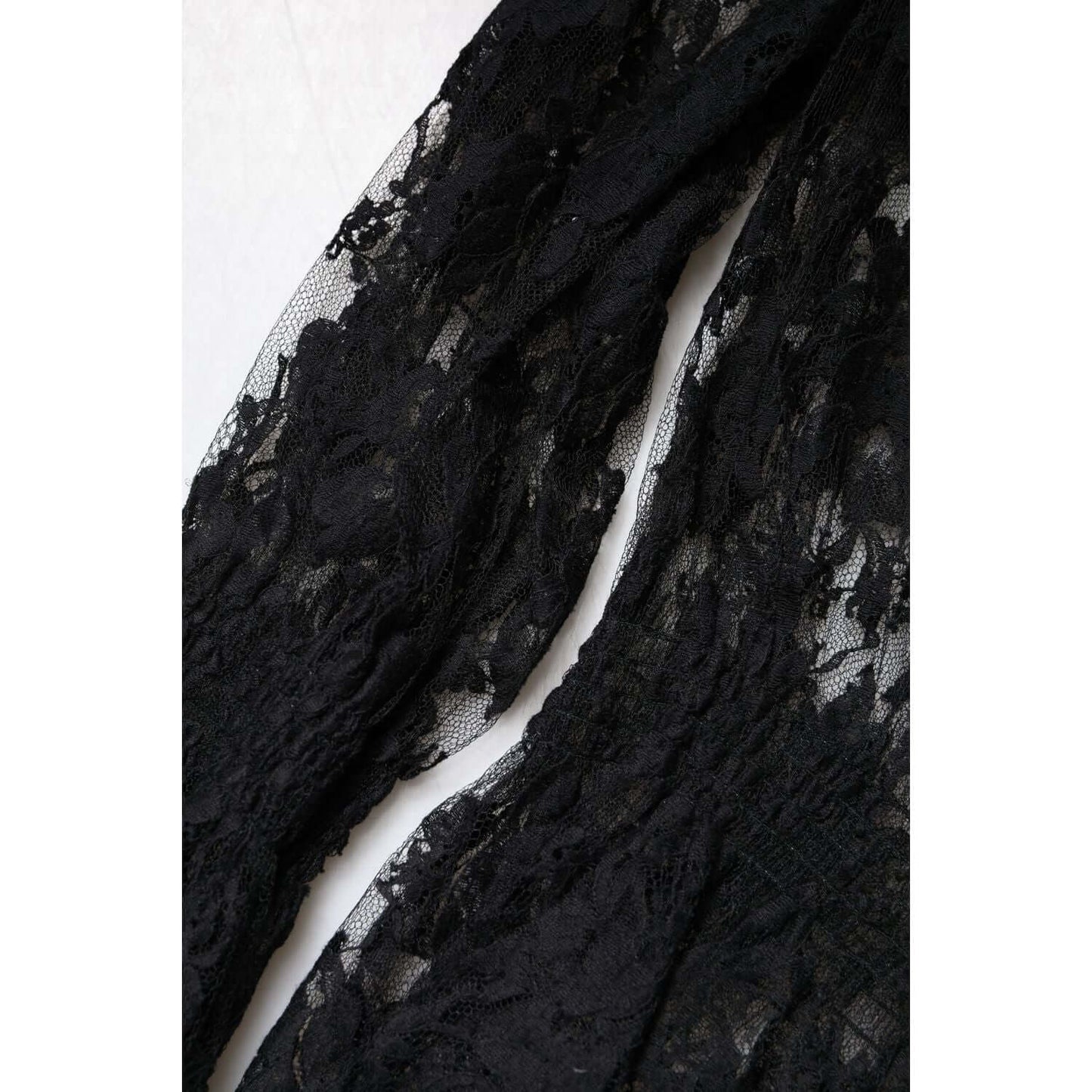 Dolce & Gabbana black floral lace blouse sleeve detail, cotton blend, long sleeves, elegant women's fashion, made in Italy.