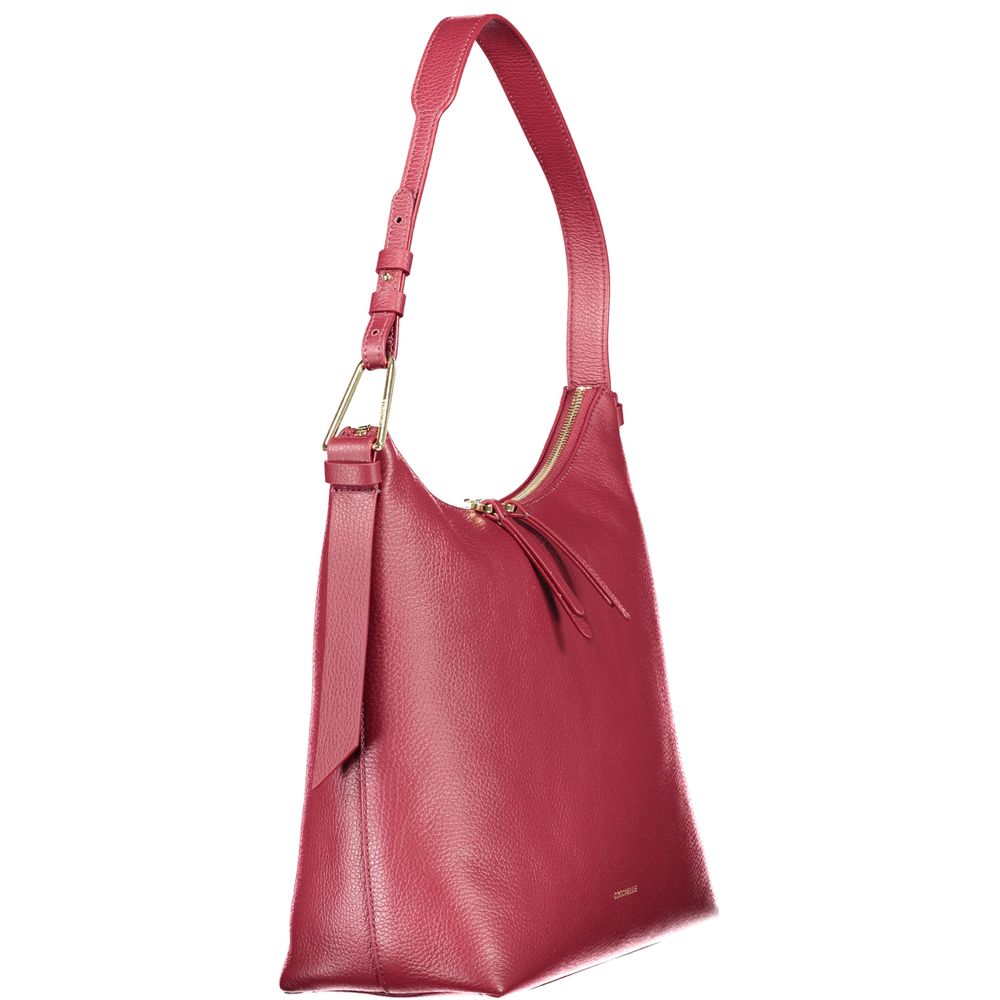 Coccinelle Purple Leather Women Handbag with adjustable strap, zip closure, and internal pocket, showcasing Italian craftsmanship.