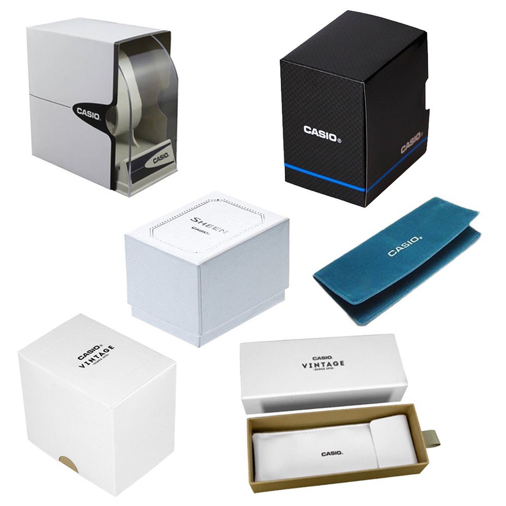 Various official Casio watch boxes for models like CASIO COLLECTION Mod. DATE, GOLD - GREEN, showcasing different packaging styles.
